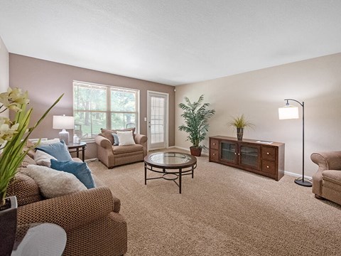 a living room with a couch and a table